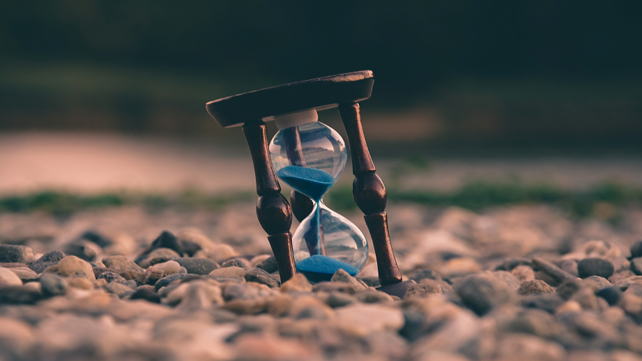 Hourglass on rocks